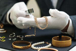 appraiser looking at jewelry